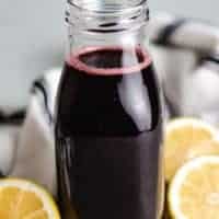 The finished syrup stored in a decorative milk bottle.