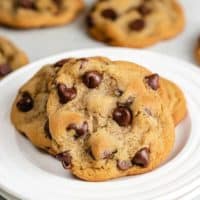The soft chocolate chip cookies on a plate.