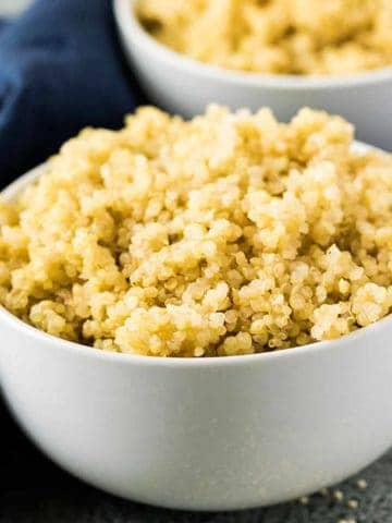 White bowl filled with Instant Pot Quinoa.