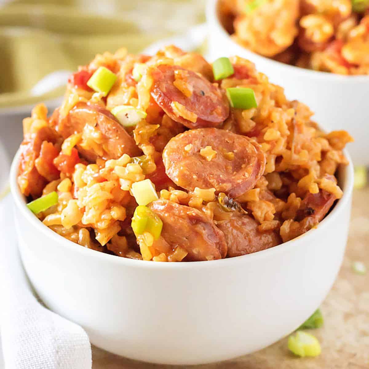 Instant Pot jambalaya in two white bowls.