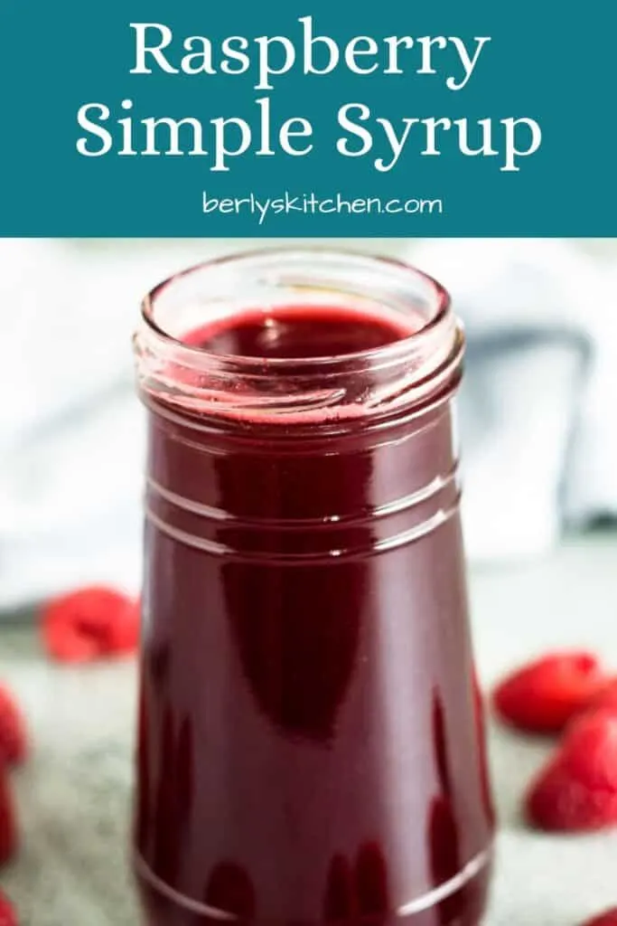 The dark and rich raspberry simple syrup in a jar.