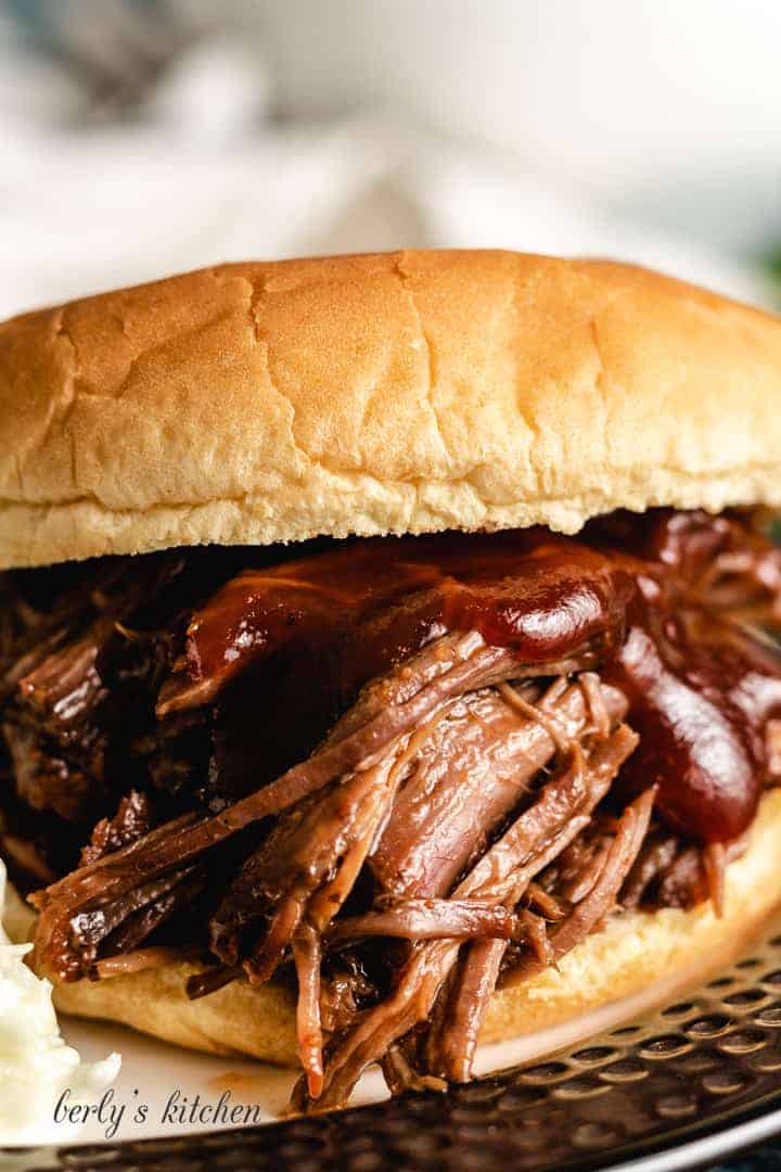 A close-up of the shredded BBQ beef sandwich.
