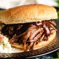 The shredded BBQ beef sandwich served with coleslaw.