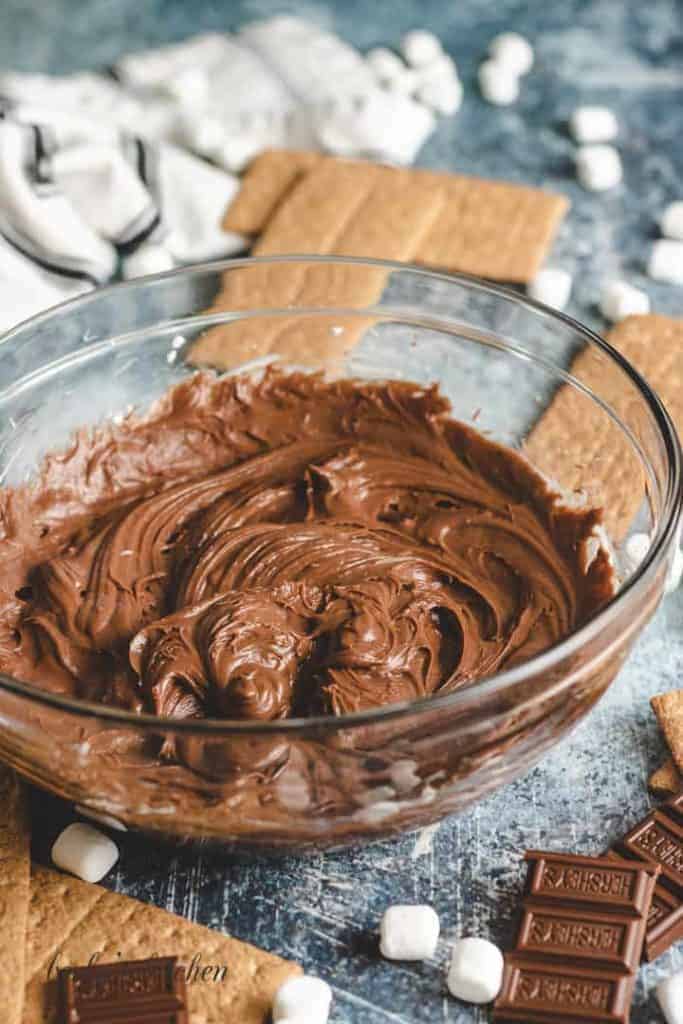 The hot fudge has been mixed with powdered sugar and cream cheese.