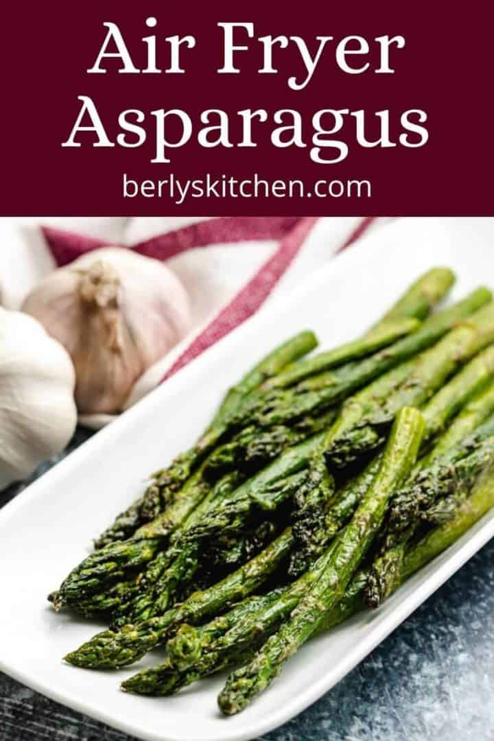 Seasoned air fryer asparagus on a decorative platter.