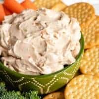 The finished French onion dip in a decorative bowl.