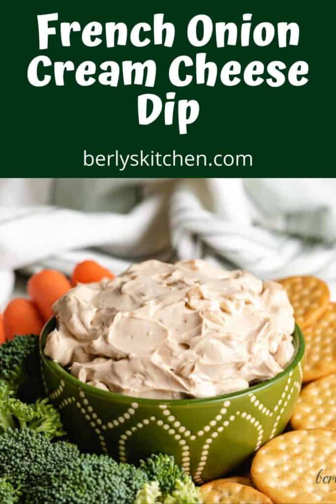 French onion dip served with broccoli, carrots, and crackers.