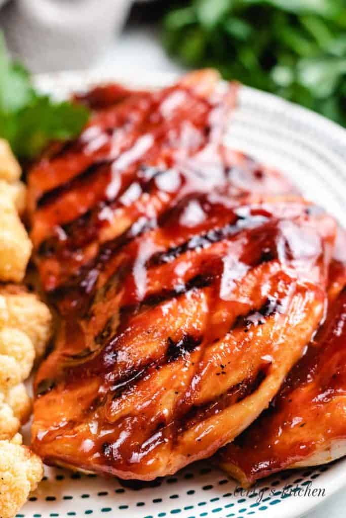 A close-up view of the finished chicken on a plate.