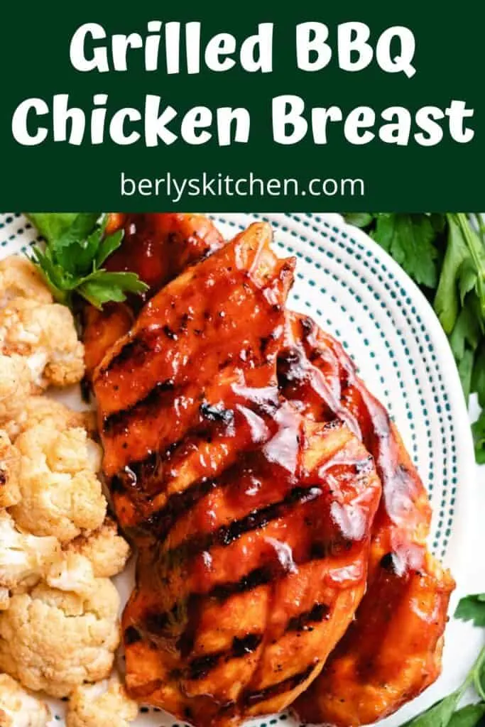 Top-down view of the grilled BBQ chicken breast on a plate.