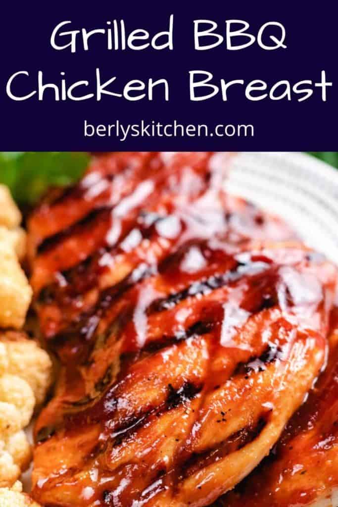 Close-up view of the grilled chicken topped with bbq sauce.