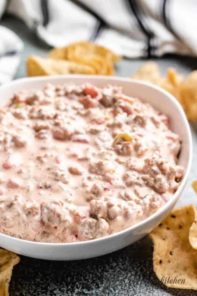 The finished dip served with tortilla chips.