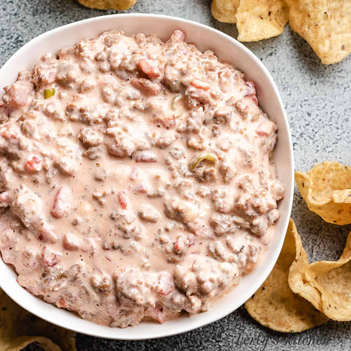 An aerial view of the Italian sausage dip with chips.
