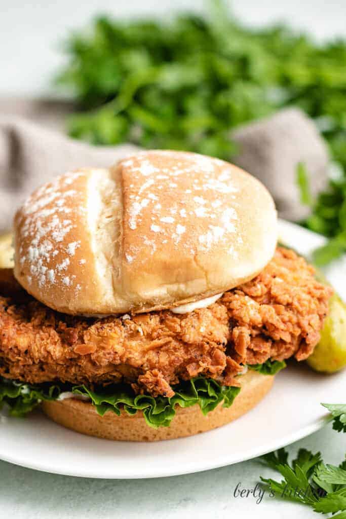 The finished fried chicken sandwich on a bun.