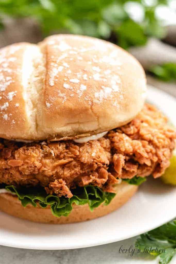 A close-up view of the chicken sandwich on a plate.