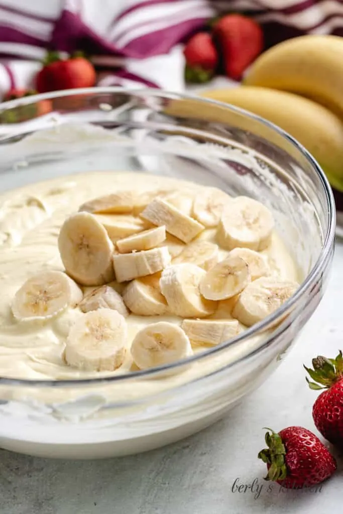 Fresh banana slices added to the bowl.