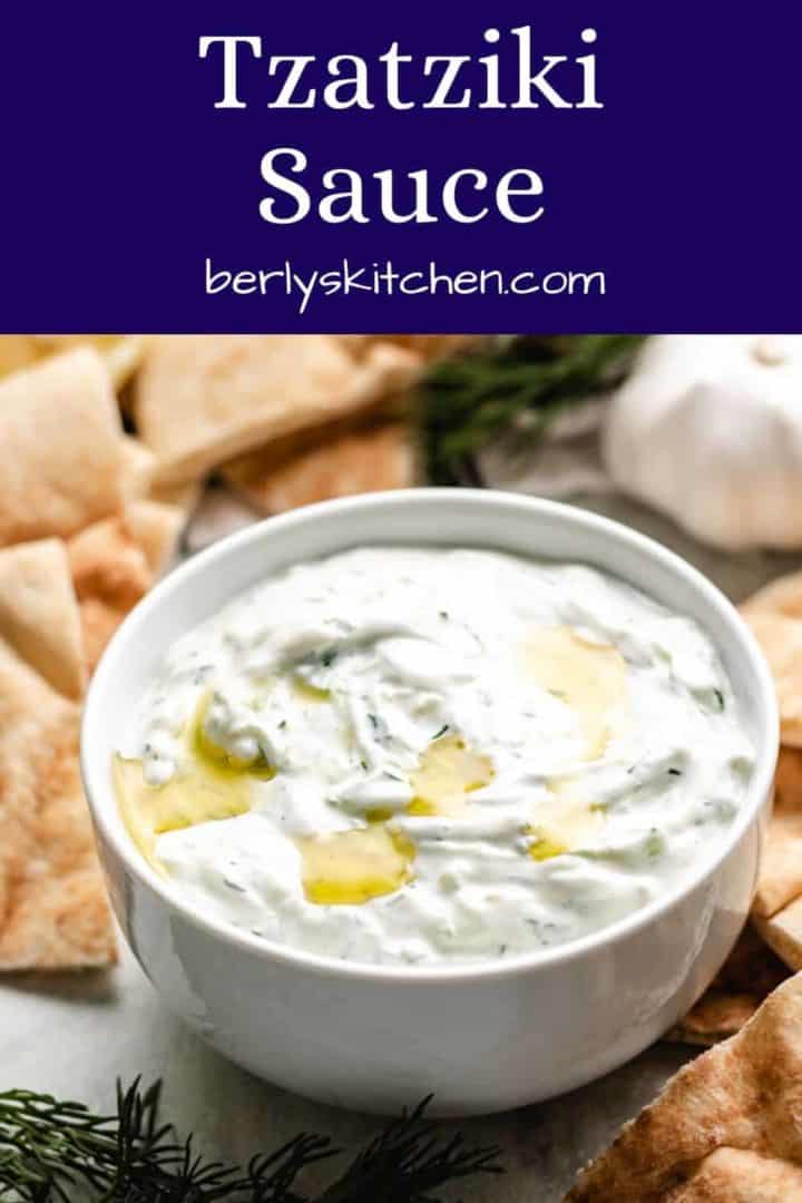 The tzatziki sauce with pita chips and fresh dill.
