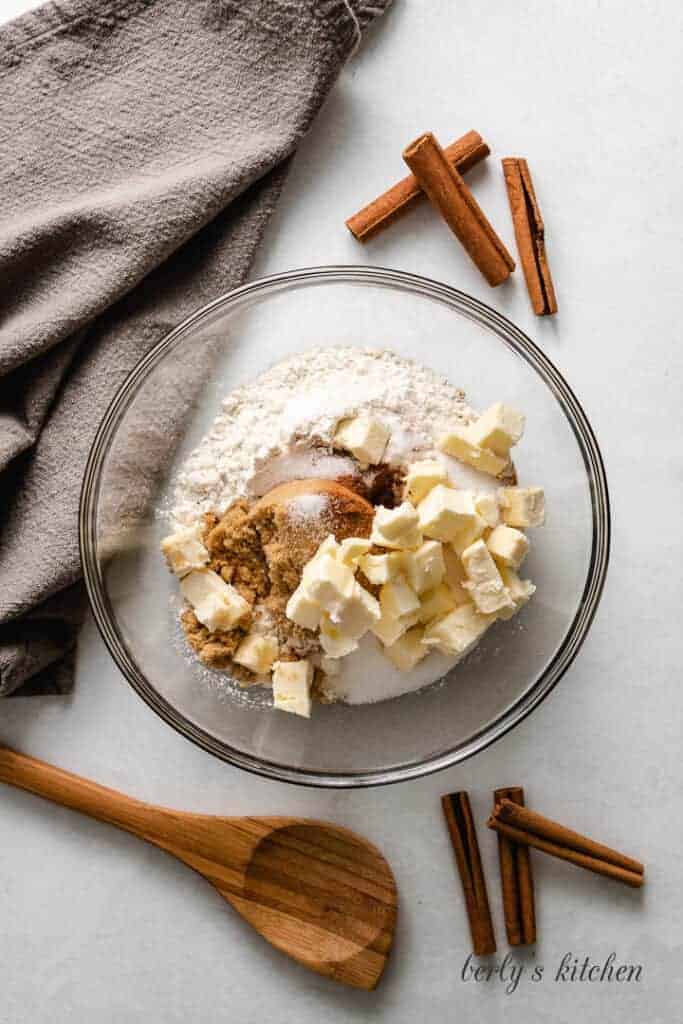 Butter, oats, and other ingredients in another bowl.