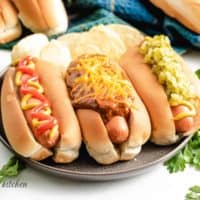 The finished Instant Pot hot dogs with condiments.