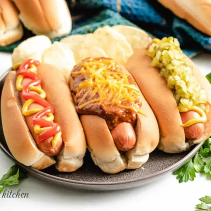 The finished Instant Pot hot dogs with condiments.