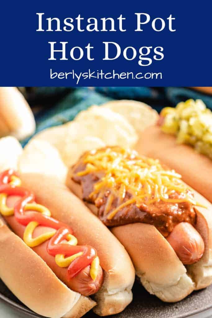 Three Instant Pot hot dogs served with potato chips.