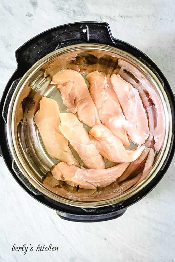 Top down view of chicken tenders in an Instant Pot.
