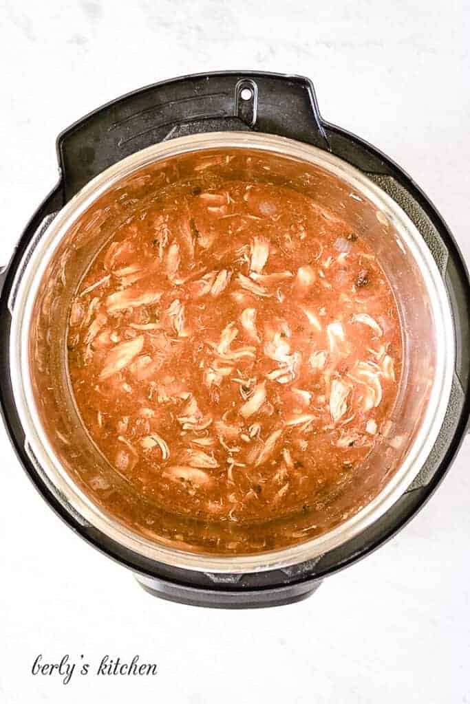 Top down view of shredded chicken in an Instant Pot.