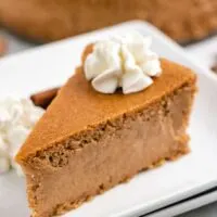 A slice of cheesecake removed from the pan.
