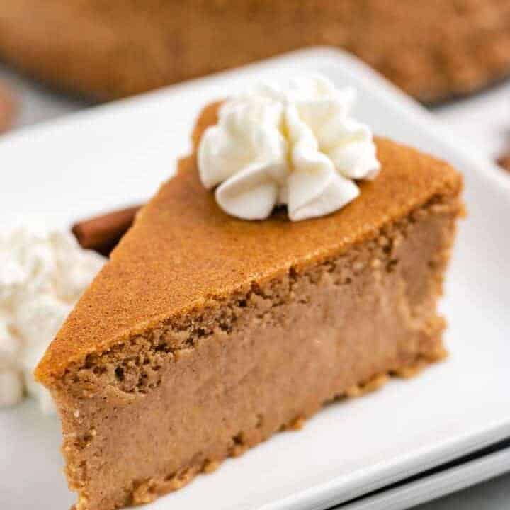 A slice of cheesecake removed from the pan.
