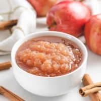 The slow cooker applesauce served in a bowl.