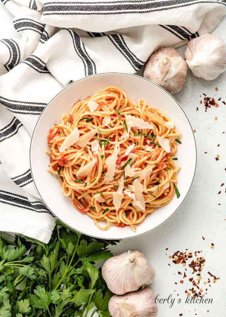 Aerial view of the pasta topped with shaved parmesan.