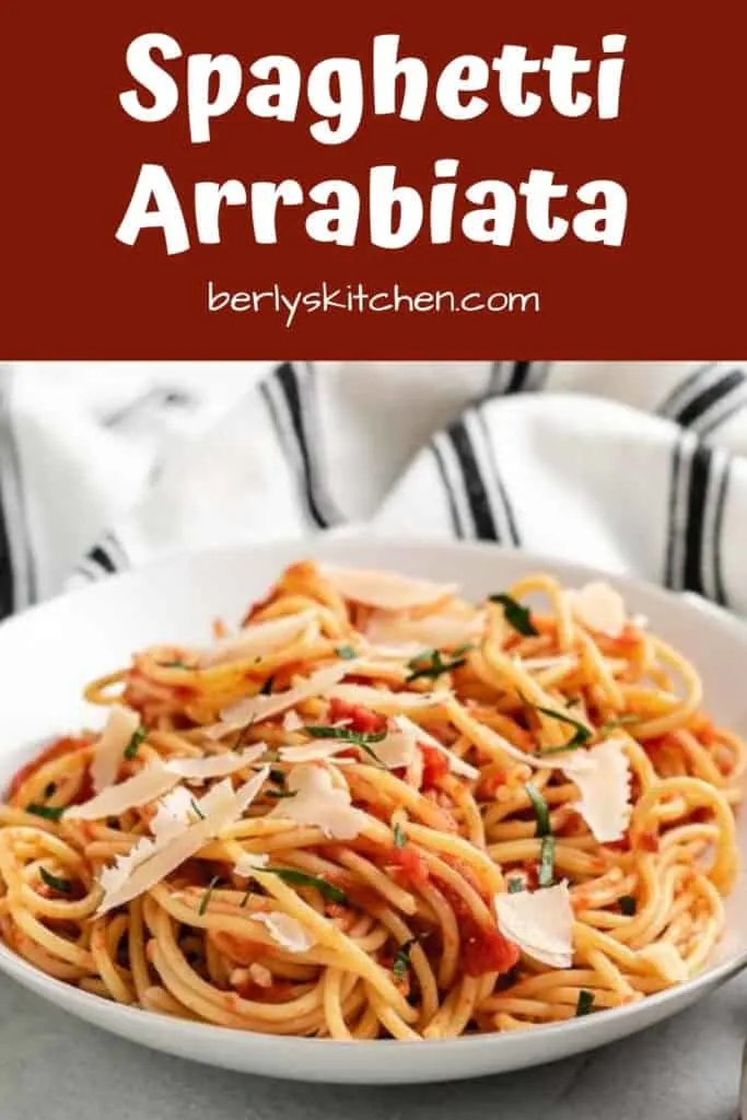The spaghetti arrabiata topped with shaved Parmesan cheese.