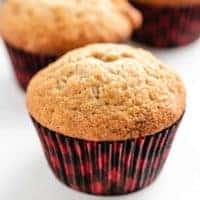 A banana bread muffin in a decorative liner.