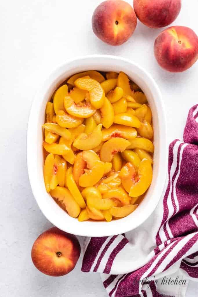 The peach mixture transferred to a baking dish.