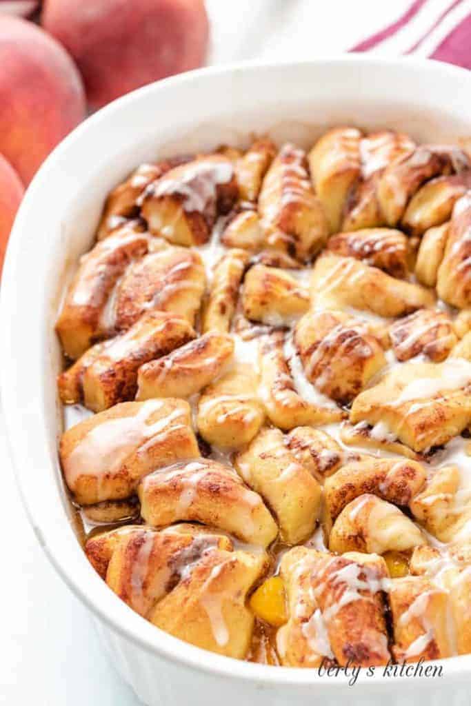 An up-close view of the baked cobbler in a baking dish.