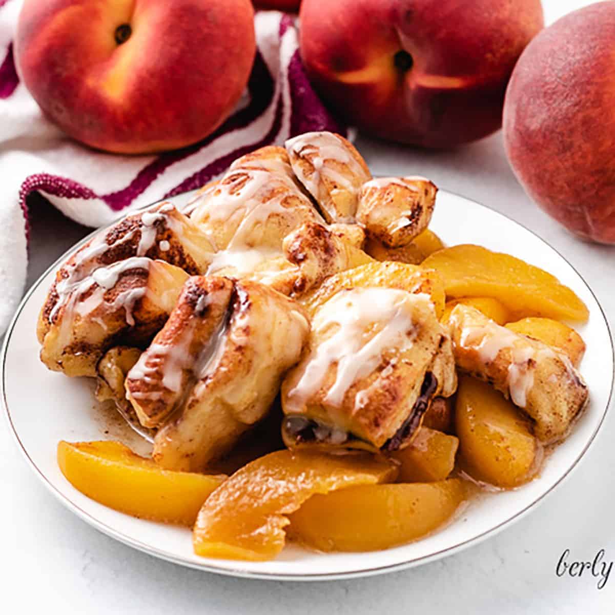 Cinnamon roll peach cobbler