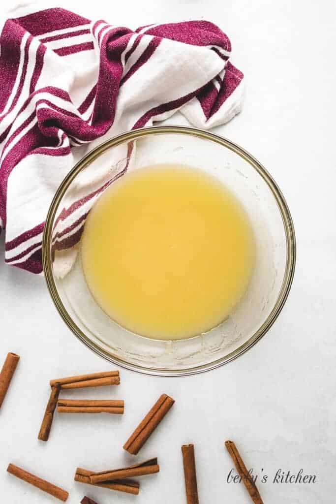 Oil, sugar, and other ingredients in a mixing bowl.