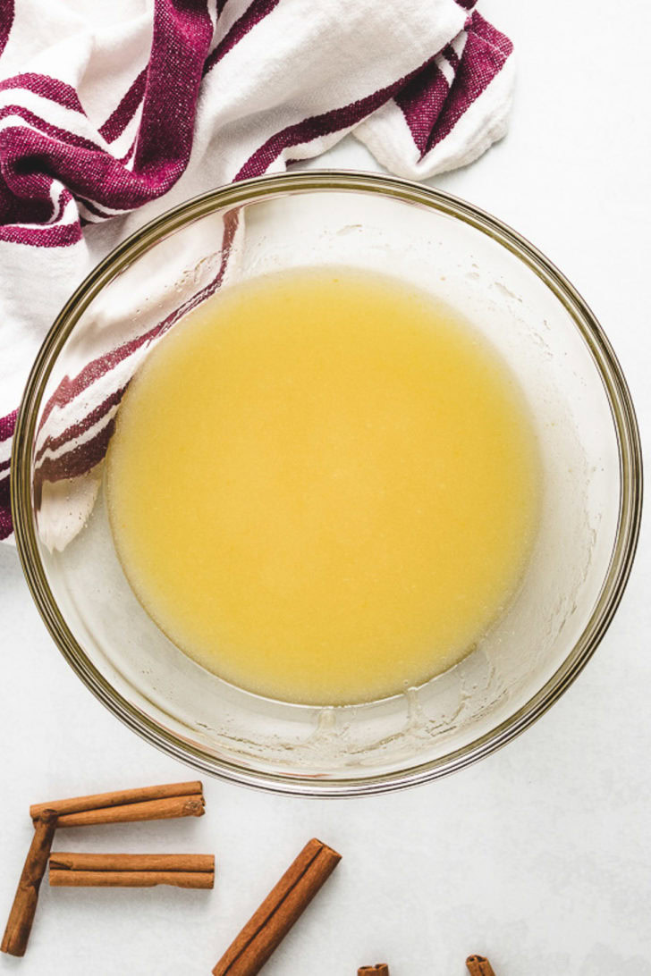 Oil, sugar, and other ingredients in a mixing bowl.