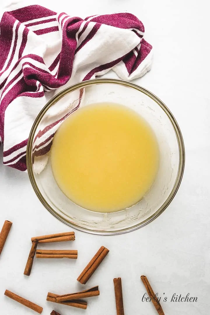 Oil, sugar, and other ingredients in a mixing bowl.