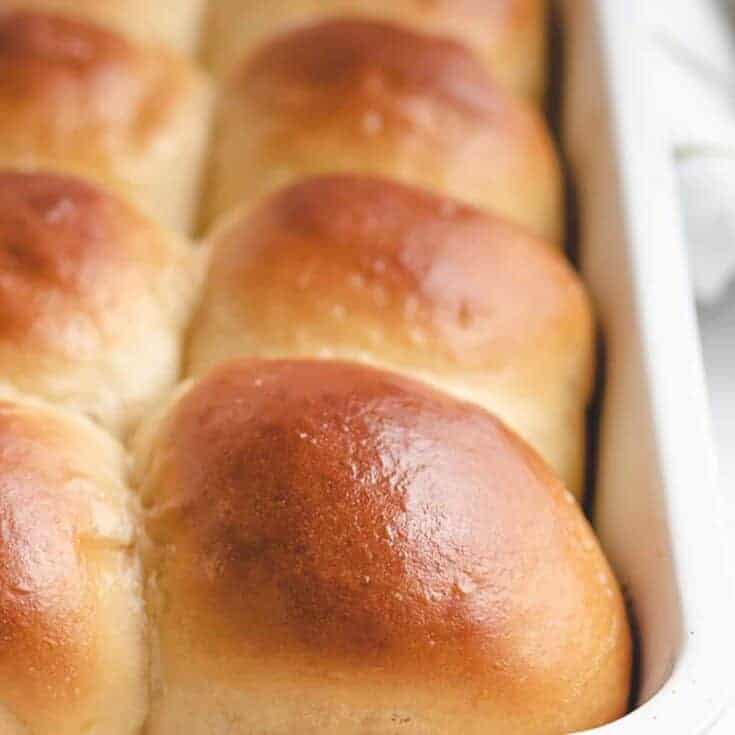 The finished Hawaiian rolls in a baking dish.