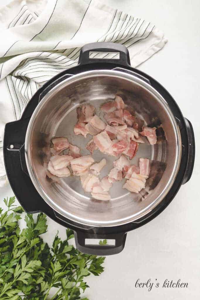 Bacon pieces in an instant pot.