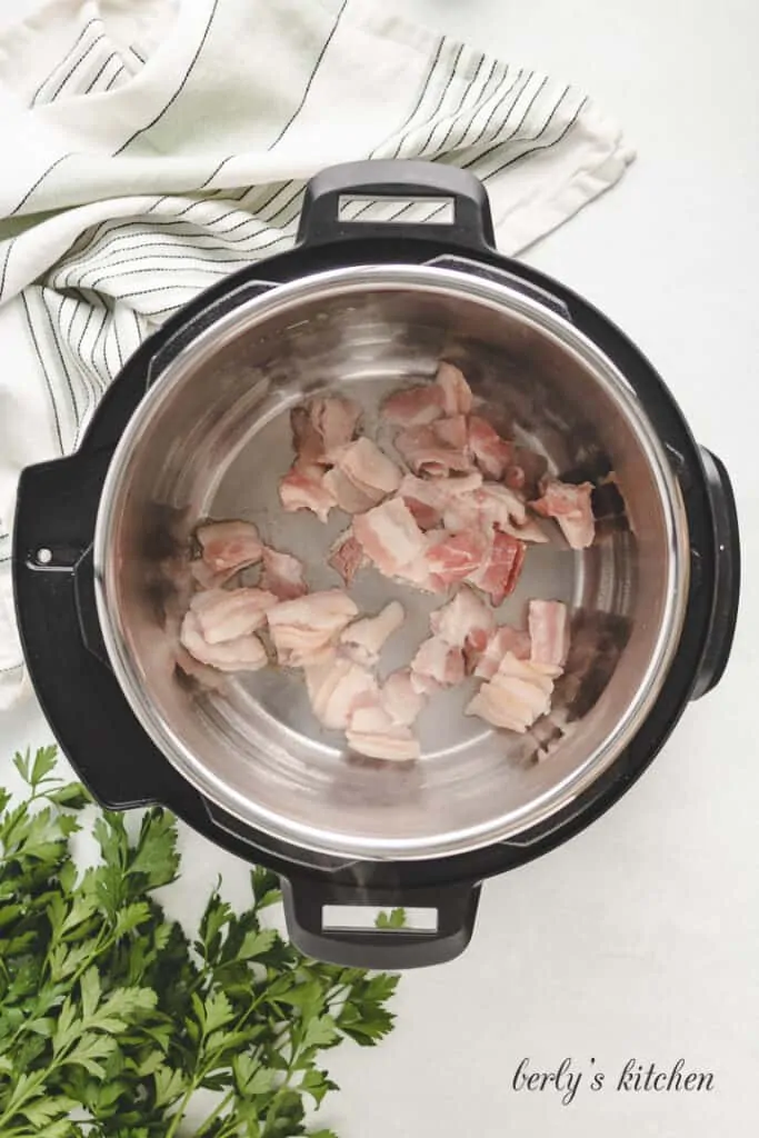 Bacon pieces in an Instant Pot.