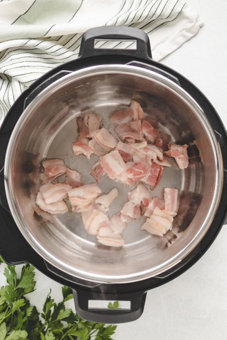 Bacon pieces in an Instant Pot.