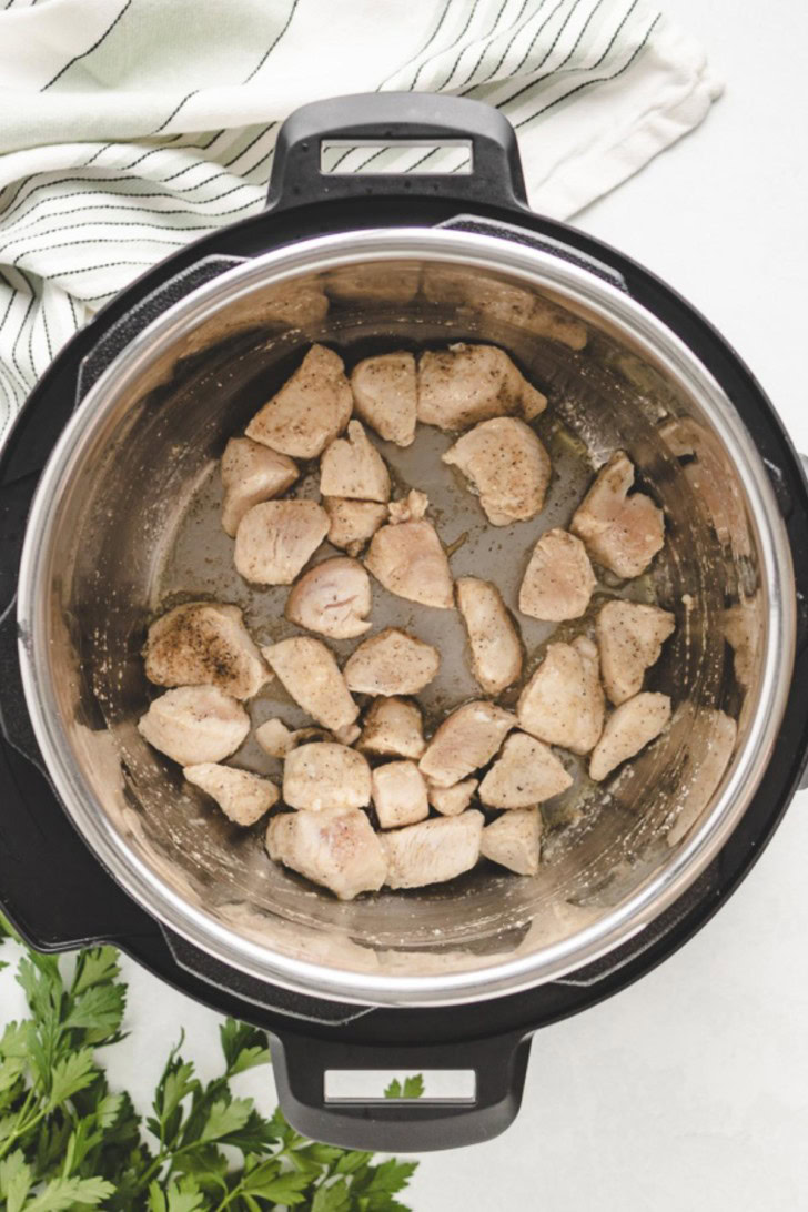 Chicken pieces in an Instant Pot.