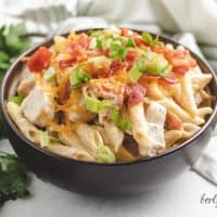Brown bowl with chicken bacon ranch pasta.