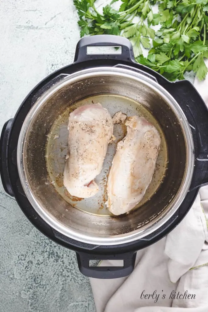 Sauteed chicken breasts in the Instant Pot.