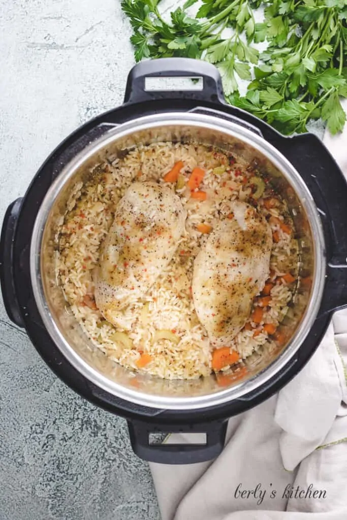 Chicken breasts with vegetables and rice in the Instant Pot.