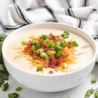 The loaded potato soup topped with bacon and cheese.