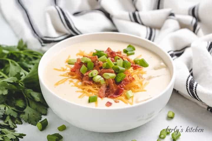 The loaded potato soup topped with bacon and cheese.