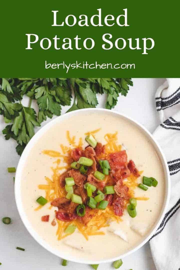 An aerial view of the baked potato soup in a bowl.