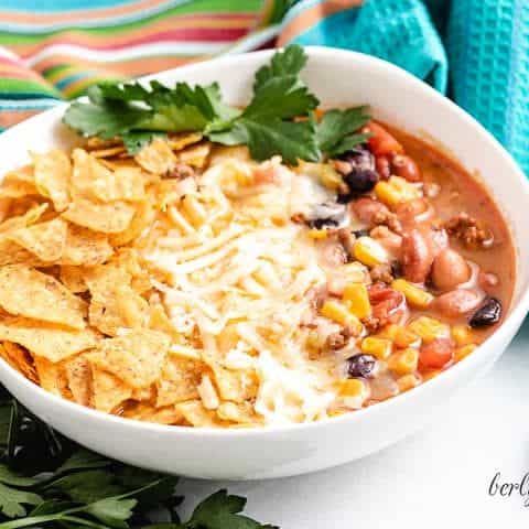 Stove Top Taco Soup Stove top taco soup served with fresh cilantro and cheese.